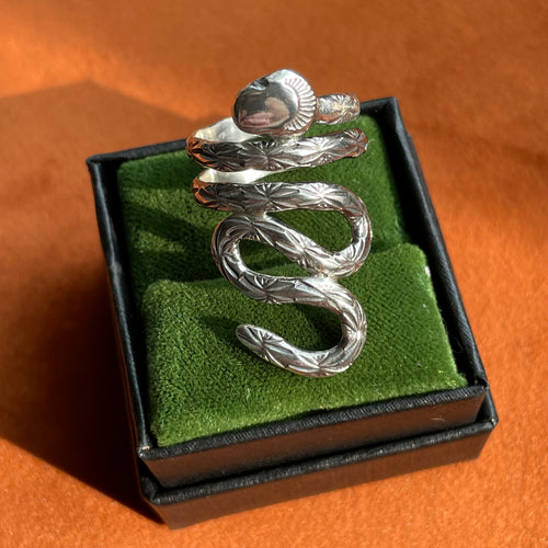 hand formed sterling silver coiled stamped snake ring